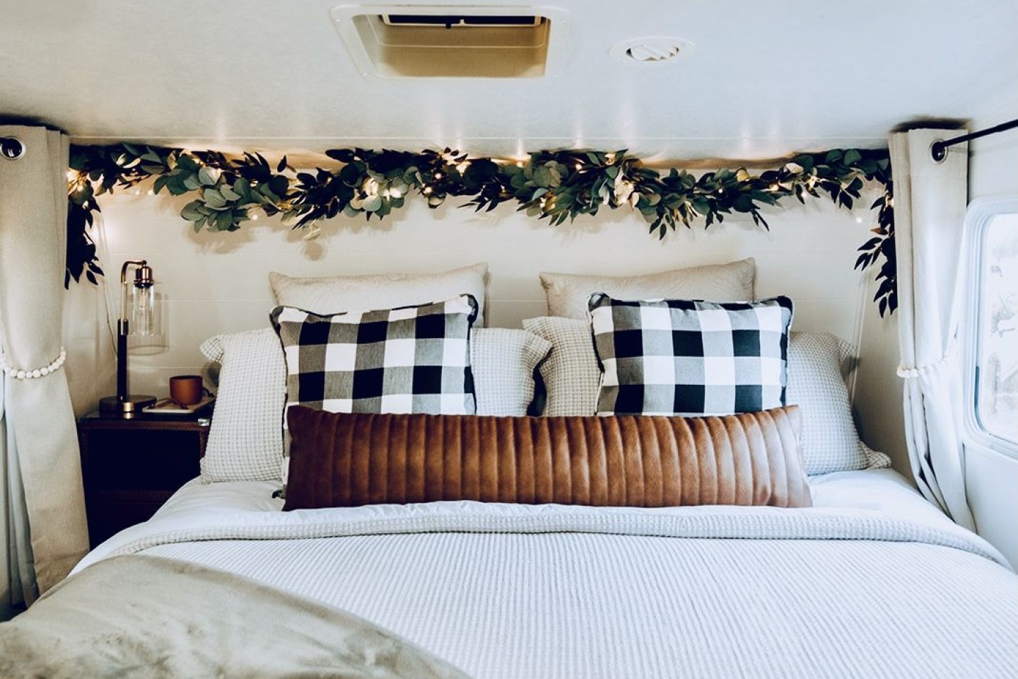 King size bed with soft sheets and comfort mattress. We have a bedside table with alarm clock and white noise machine. The curtains are blackout for a deep sleep.