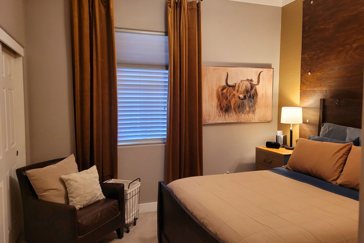 Bedroom w/ Adjustable Queen Bed Accommodations & Chair