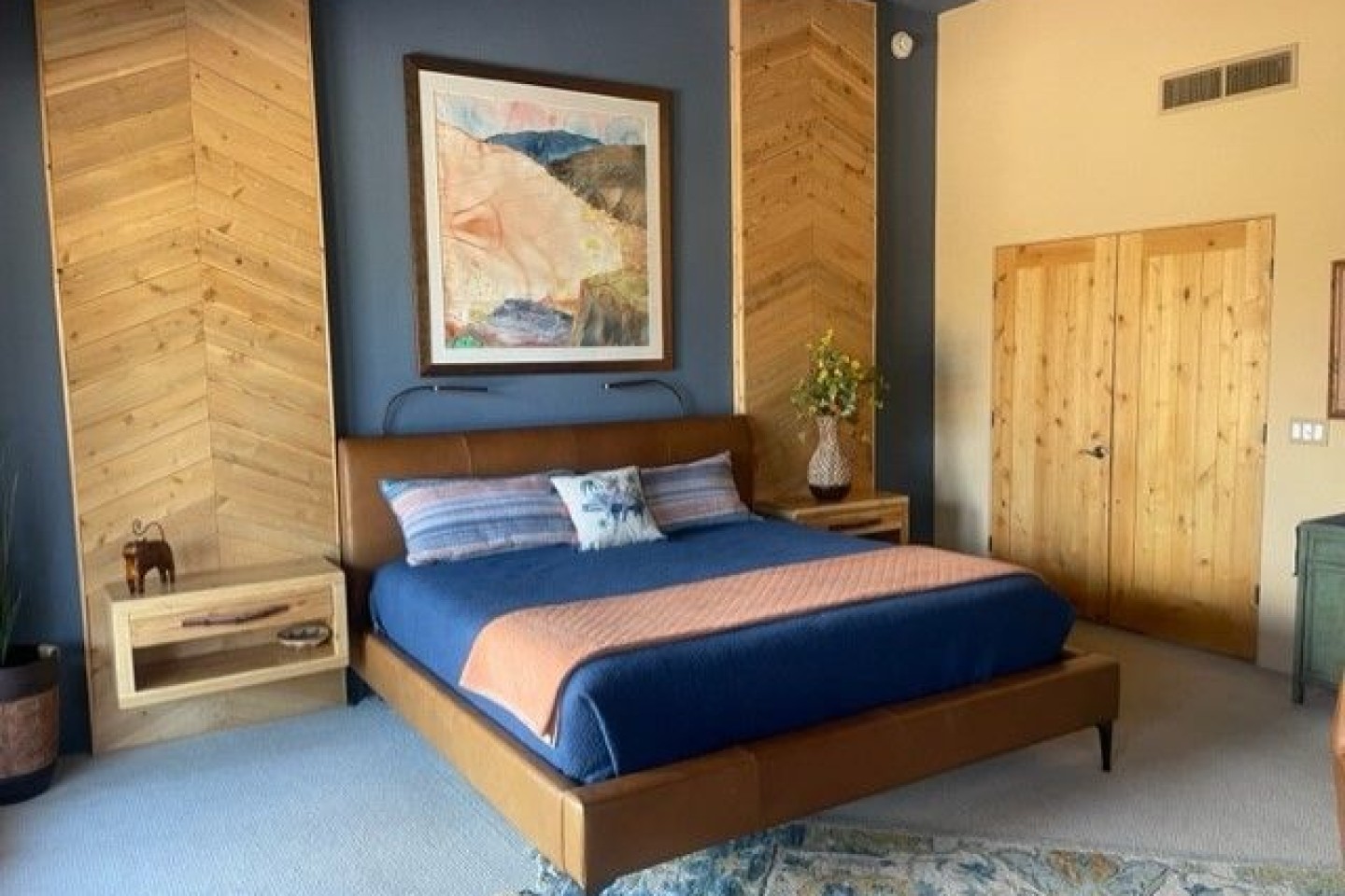 Leather King size bed with organic mattress.