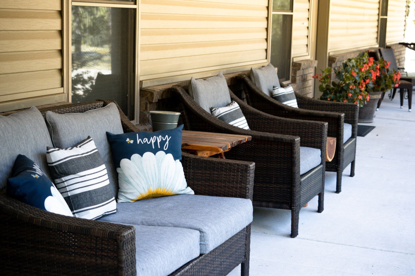 Outdoor lounge area in front of house