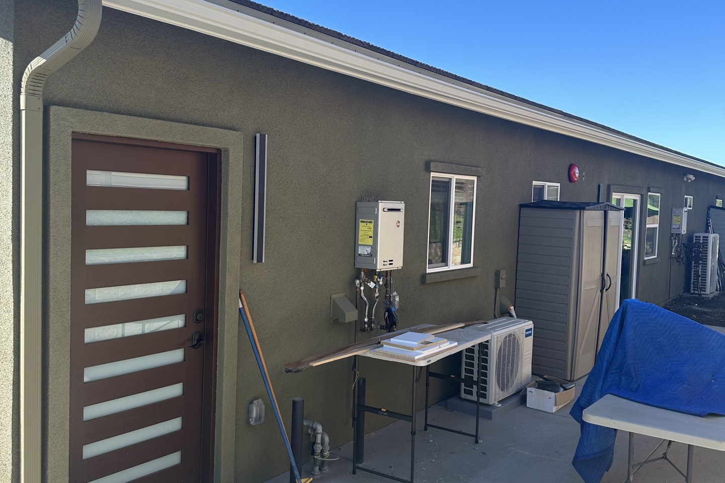 Finishing the outside for a private patio space in this lovely ADU.